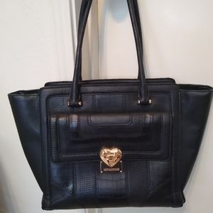 Love Moschino black tote with gold heart hardware with original dust bag